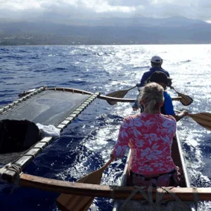 Outrigger canoe on calm ocean waters near Wailea Beach