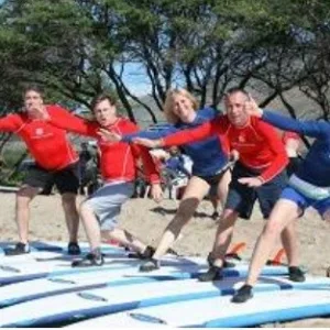 Group of children preparing for surf lesson at Kalama Park