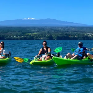 Kayakers paddling near Coconut Island in Hilo Bay
