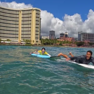 Private surf lesson in Waikiki with instructor and student