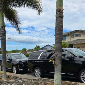 Black Cadillac Escalade parked ready for private transport